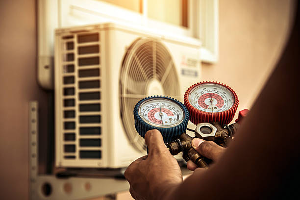 Professional Hvac technician working in Walls, MS